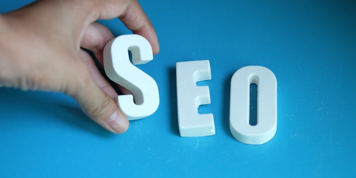 Hand arrange white letters as SEO