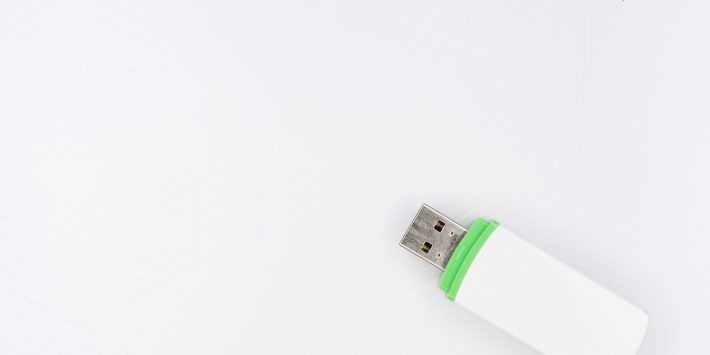 white and green disposable lighter