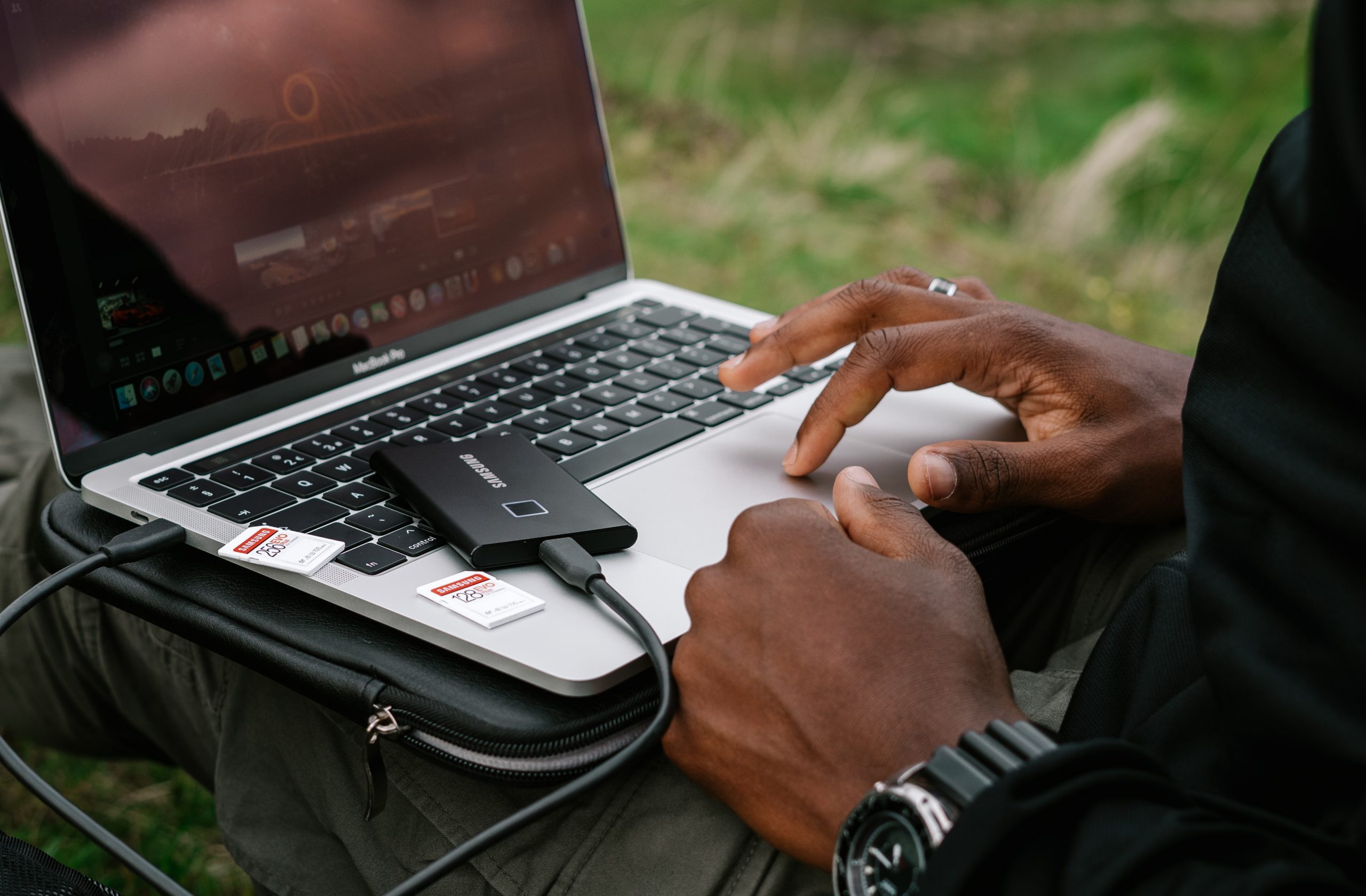 person using gray asus laptop computer