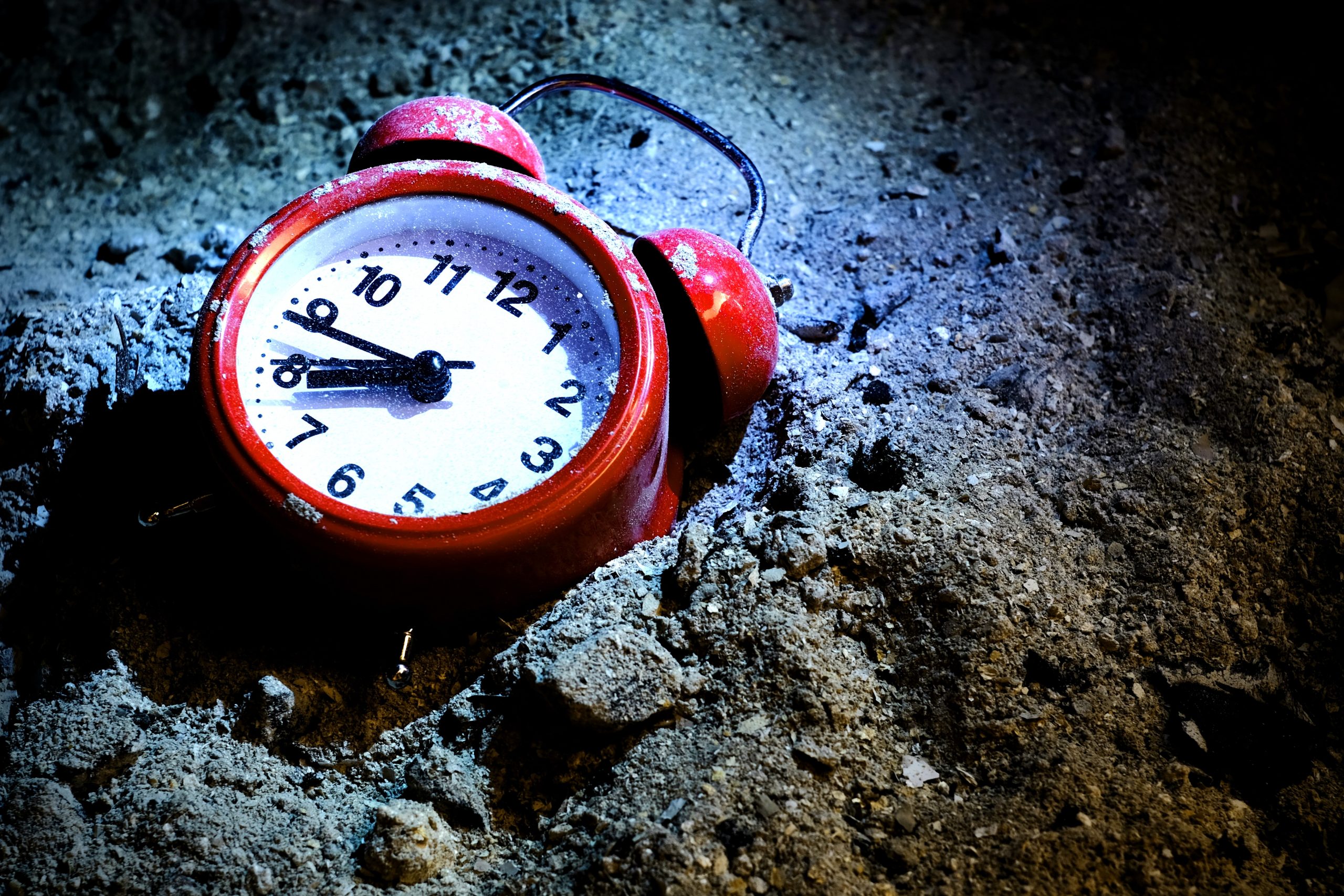 red and white alarm clock